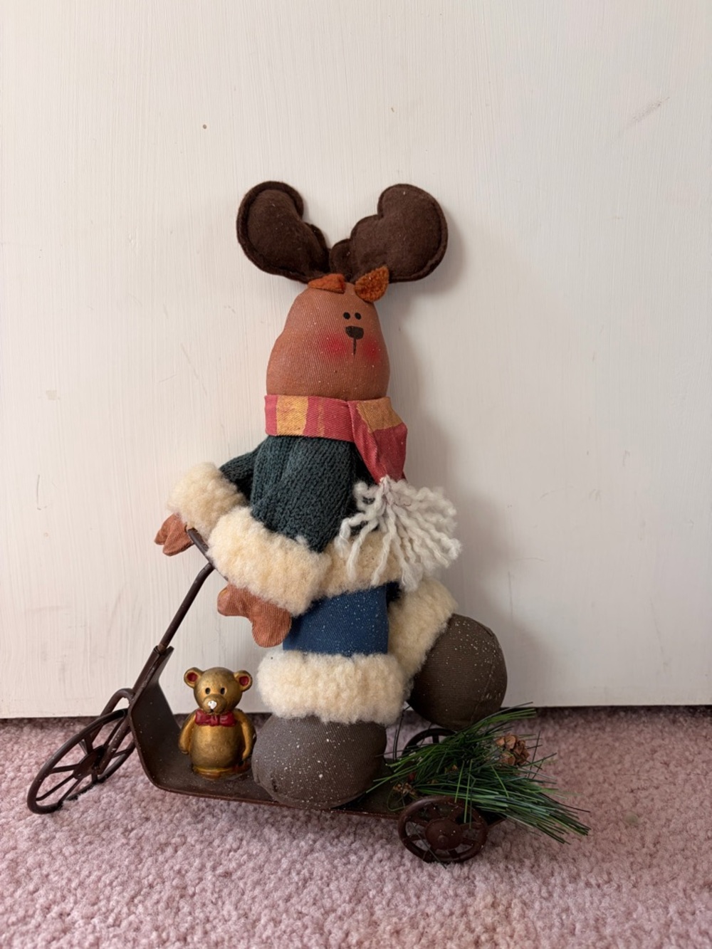 Moose riding a metal Scooter